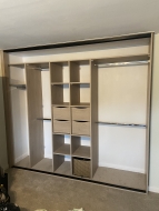 Cotta Cremona Oak wardrobe, with inset drawers, hanging and shelving, fitted in Great Ayton